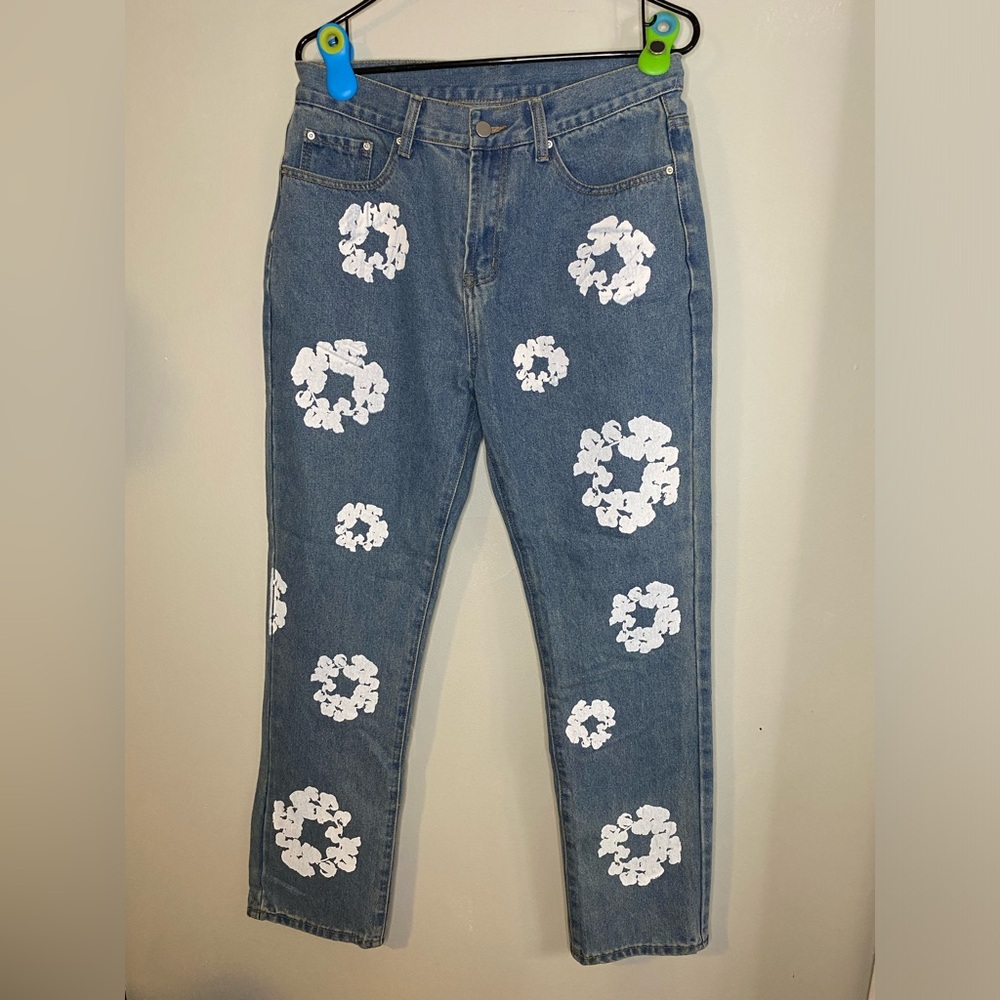 tearing denim jeans